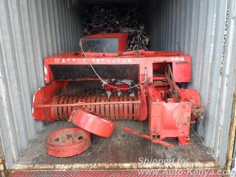 Truck Farm Machinery and Bikes in a 40 FT Container