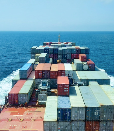 Cargo ship carrying containers in the ocean