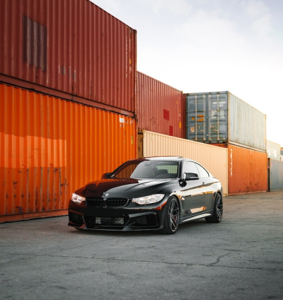 A BMW Car near shipping containers