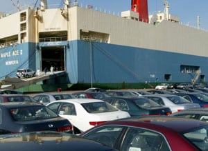 Cars which needs to be shipped parked near a shipping deck